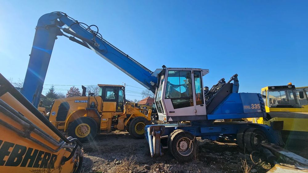 Fuchs MHL 335 Terex Excavator pe roti pentru fier vechi cabină liftantă