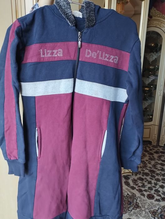 Sportivniga oxshagan xalat lozim