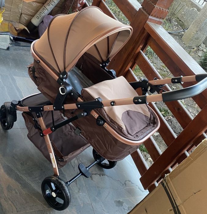 Vând carucior,leagan,suport baie,rotobil