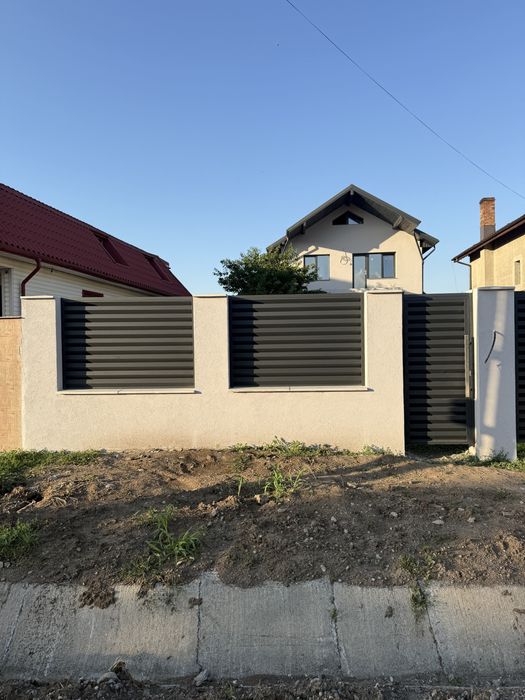 Confectii metalice,Panouri Gard,Porti balamale si  Role,Usi Garaj,balustrade balcon,maini curente scara