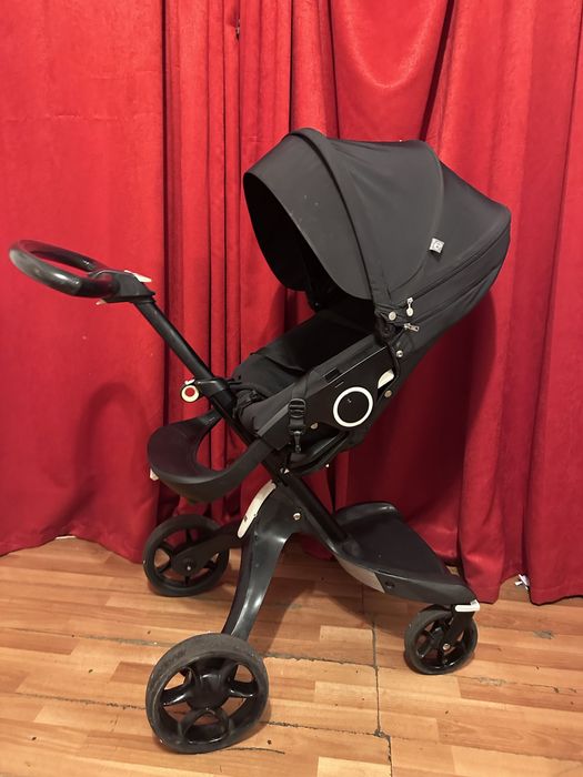 Carucior Stokke stare excelenta umbrela si geanta negru
