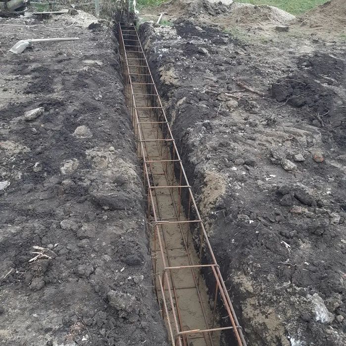 Заливка фундамента на забор