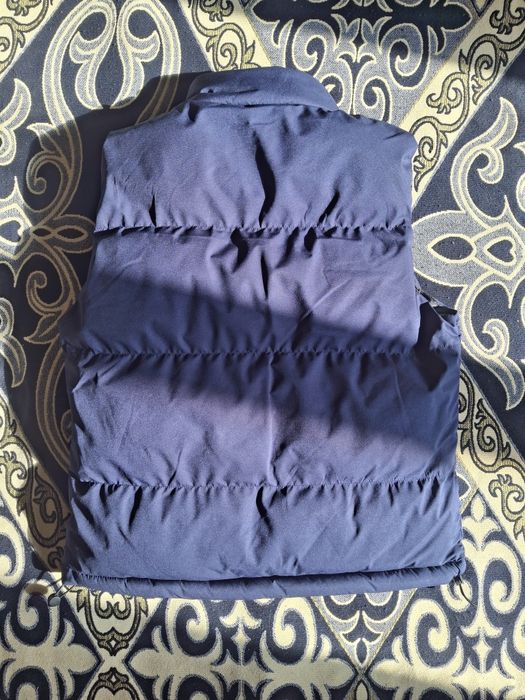 Новый безрукавка