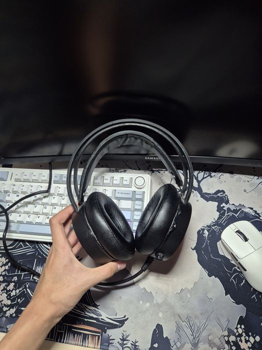 Продам наушники Tanbow C3U