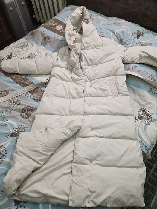 Продам пуховик новый