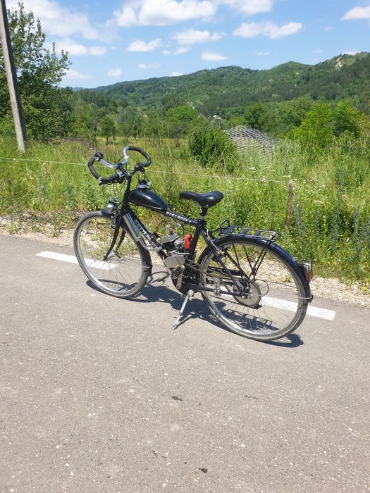 Bicicleta cu motor vand sau schimb cu pc plus diferența din partea mea