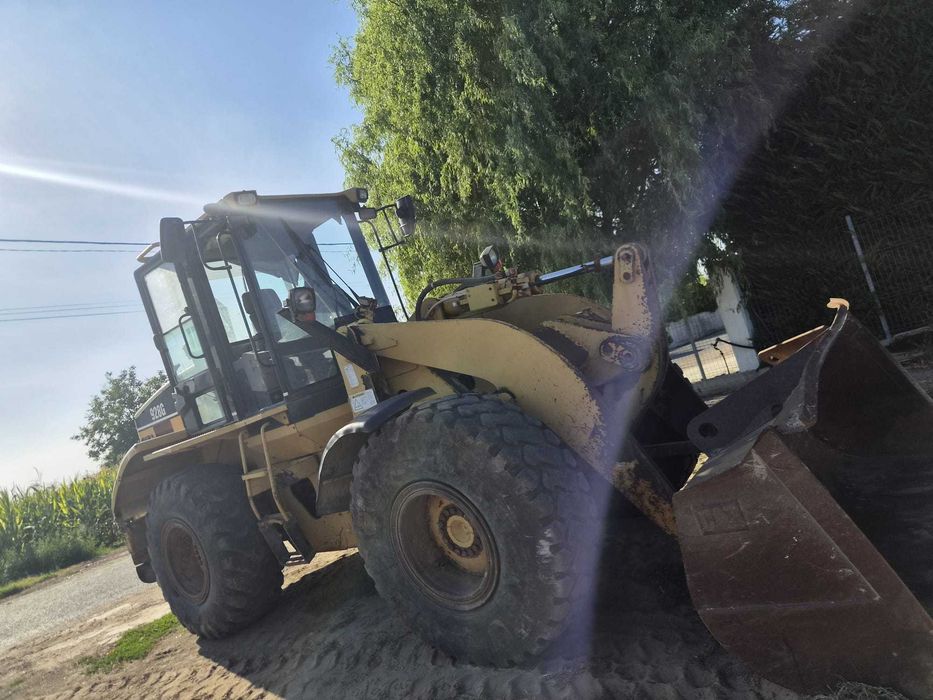 Incarcator Frontal Vola Caterpillar 928G anul 2001 14 tone, recent adus, 21.500 € schimb cu Buldoexcavator