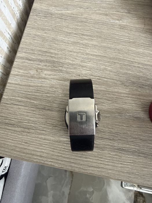 Tissot race. Safir cristla   Carbon titan.