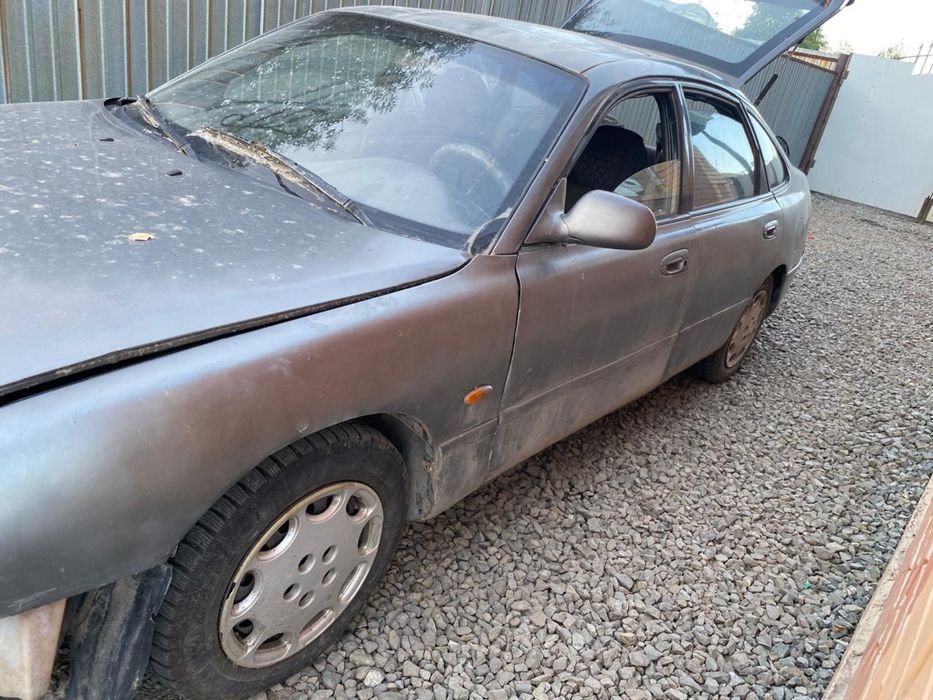 Мазда Кронос по запчастям