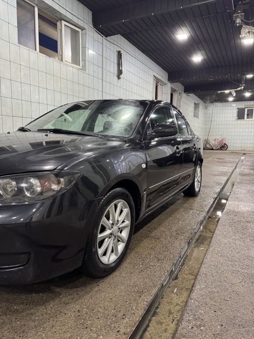 Mazda 3 2009yil benzin propan
