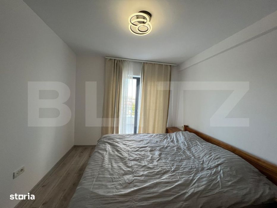Apartament modern cu terasa de 15 m2 si priveliste panoramica – 58 m