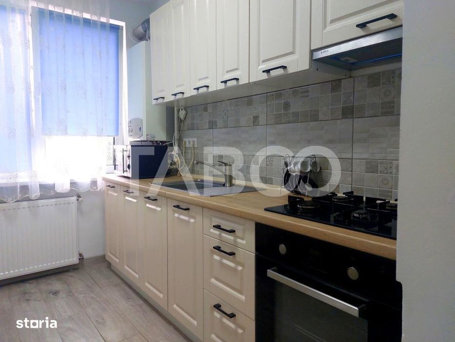 Apartament renovat recent 2 camere parter balcon zona Dioda Sibiu — fotografia 1