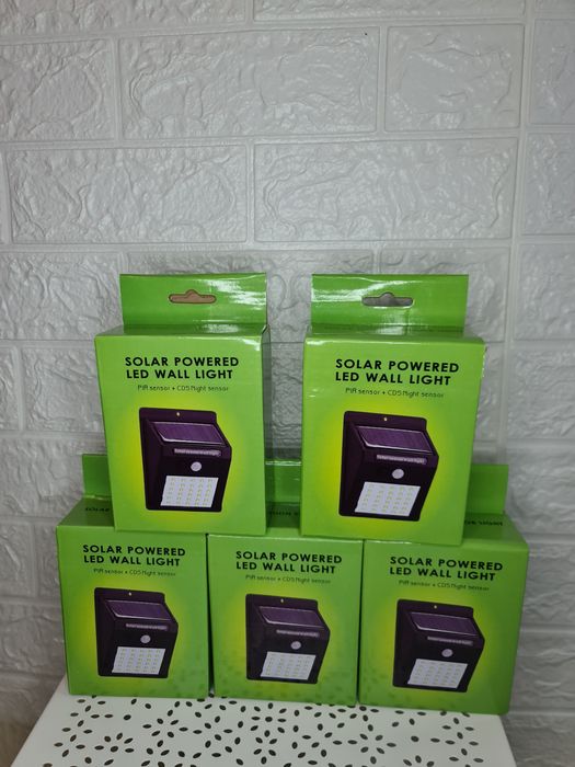 100lei Livrare GRATUITA set 4 lămpi solare perete/gard