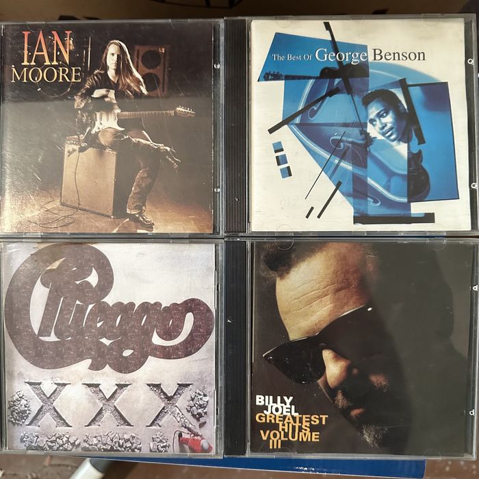 Компакт-диски с рок-музыкой