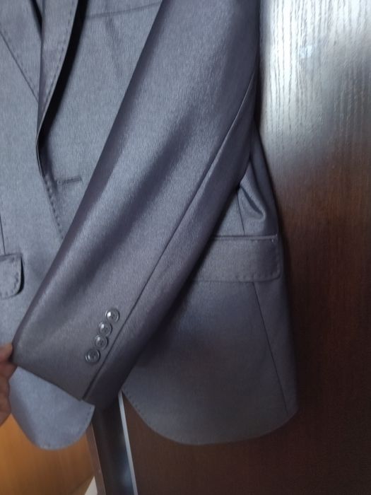 На парня костюм  двойка  46 размер .