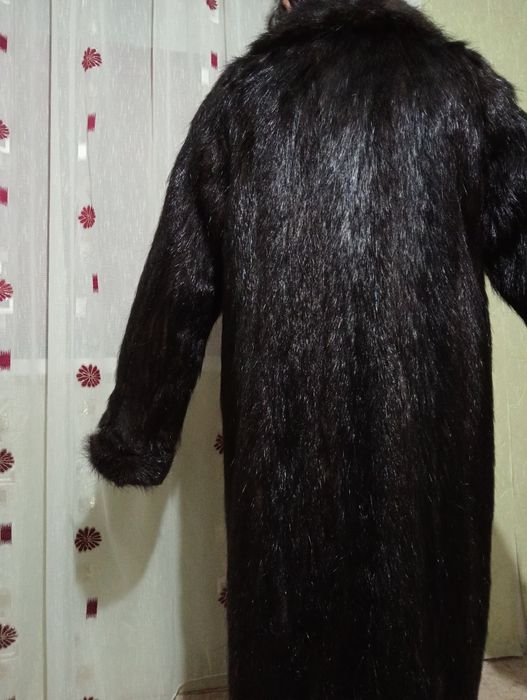 Одежда женская верхняя.