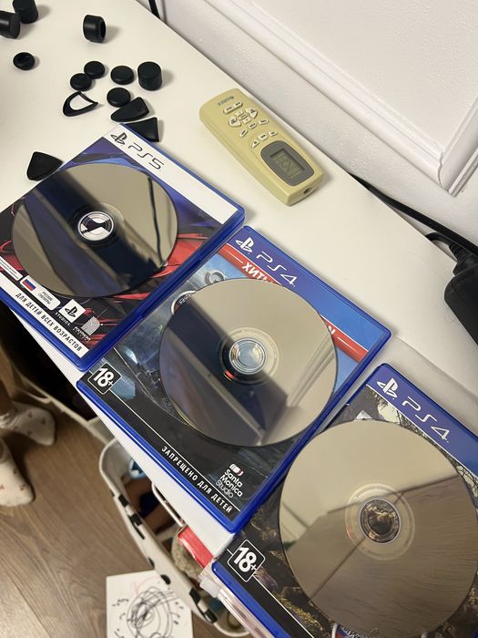 Диски для PlayStation + аксессуары