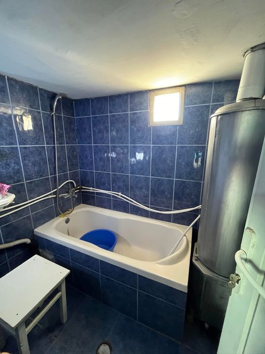 Casa la tara cu gradina