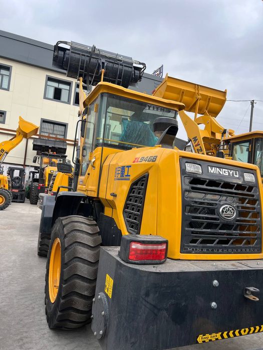 Фронтальная погрузчик миксерли