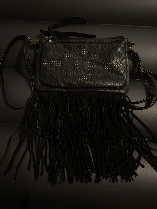 Кожаная сумочка в стиле бохо