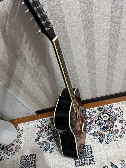 Caraya gitara xolati zõr