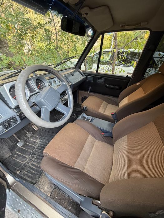 машина Isuzu Trooper