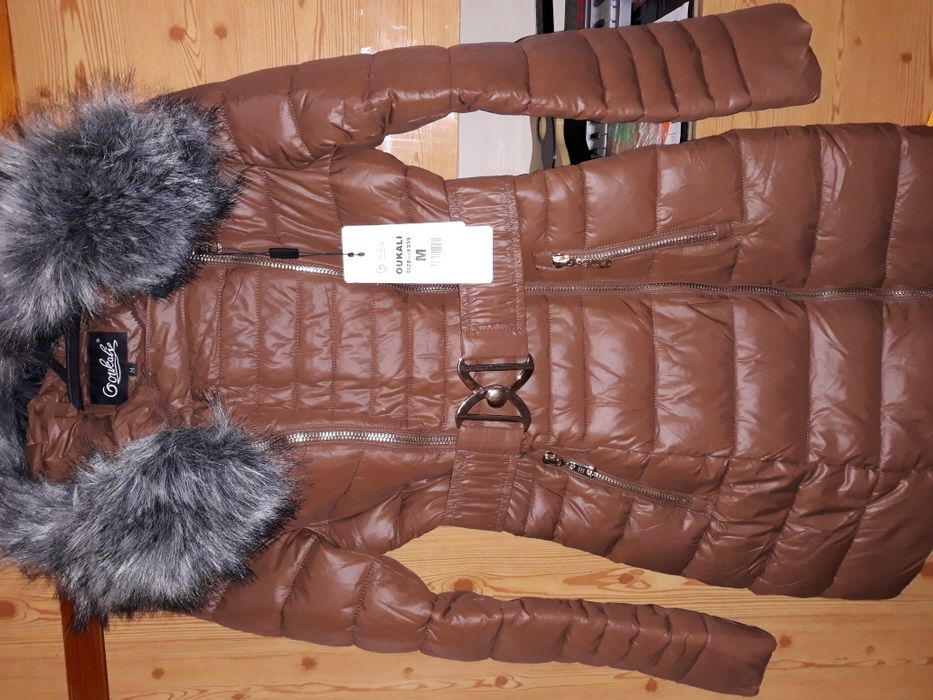 Продам пуховик новый