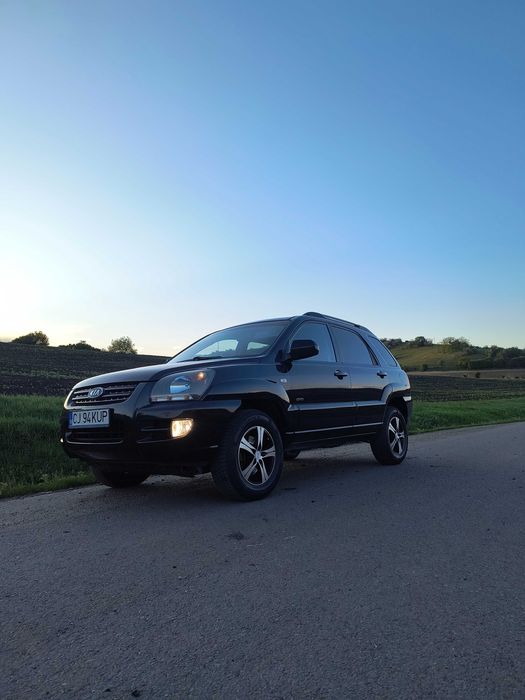 KIA Sportsge  E4. 140 cp 4x4