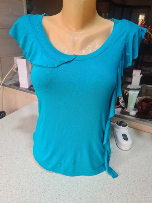 Женская блузка с воланами