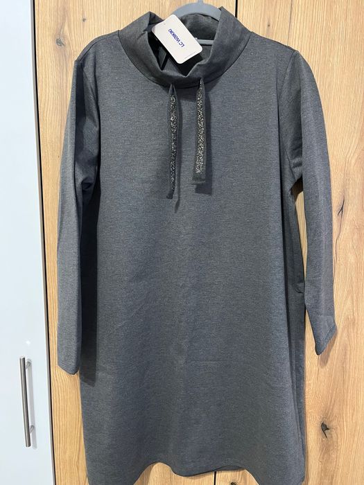 Дамски пуловери и рокли