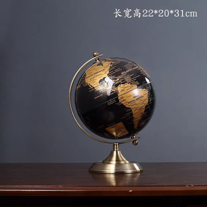 Этот роскошный черно-золотой глобус станет настоящим украшением любого