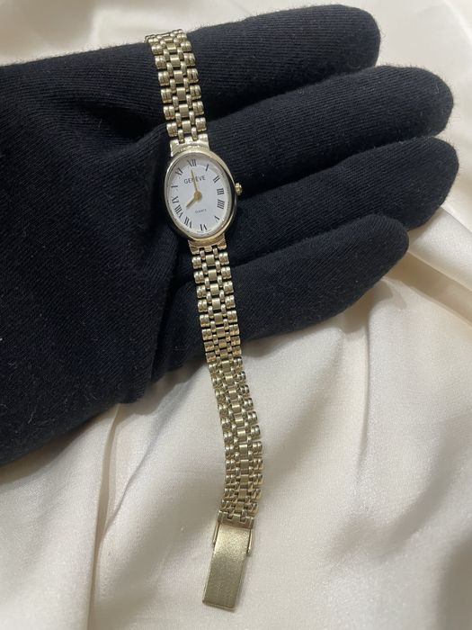 Золотые женские часы