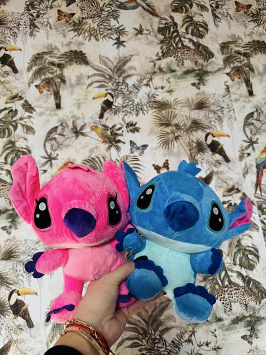 Ursulet plus stitch canta melodia desenului disney