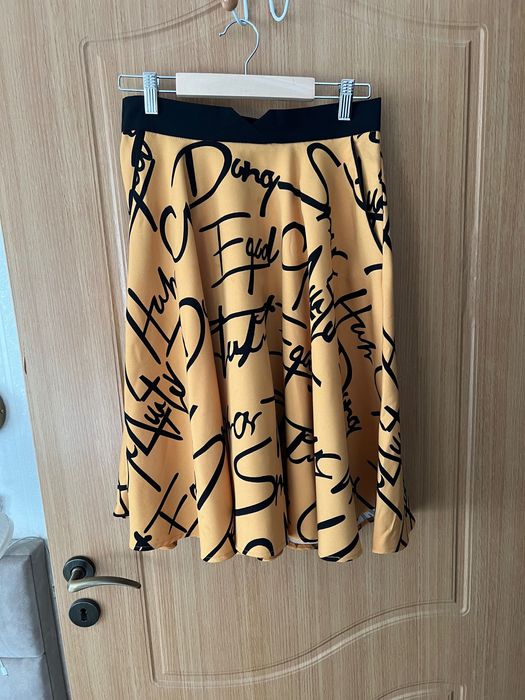 Fusta midi evazata galben cu negru