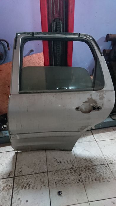 Запчасти Мазда Трибут