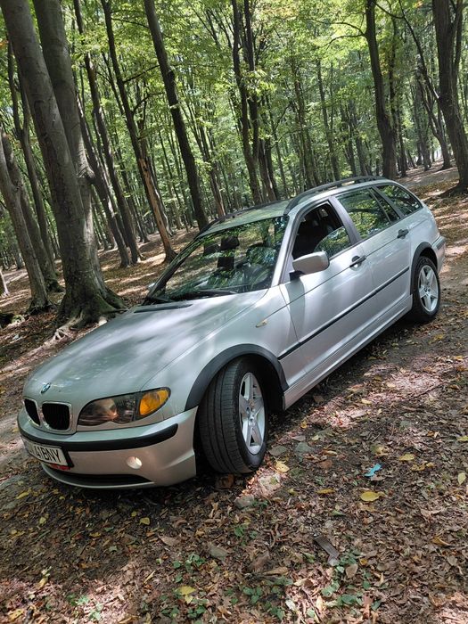 BMW 320d an 2003 150 cai
