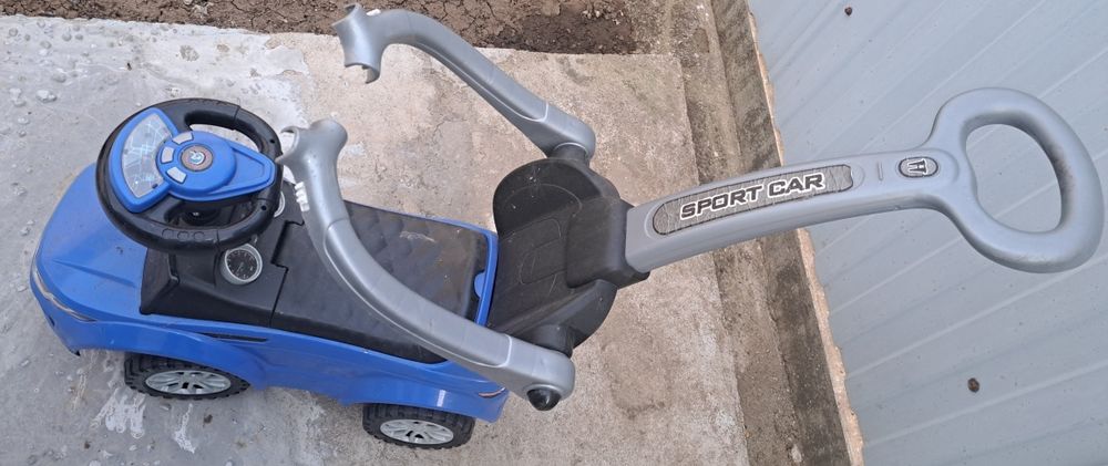 Masinuta copii Nelik, plastic, greutate maxima 27 kg, albastru, cu melodii, maner de impins pentru parinti
