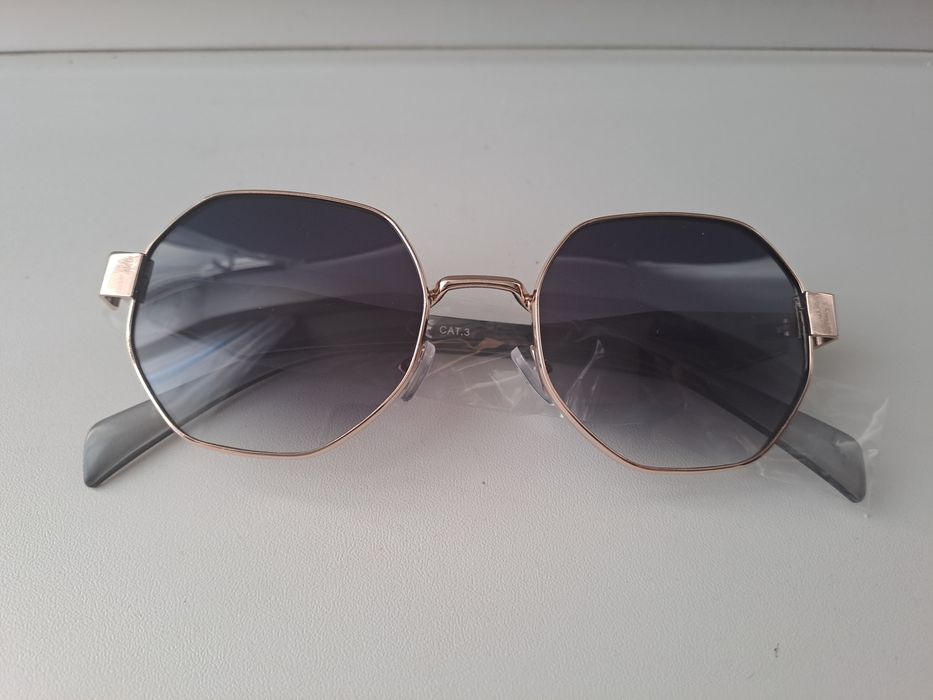 Продам очки солнцезащитные