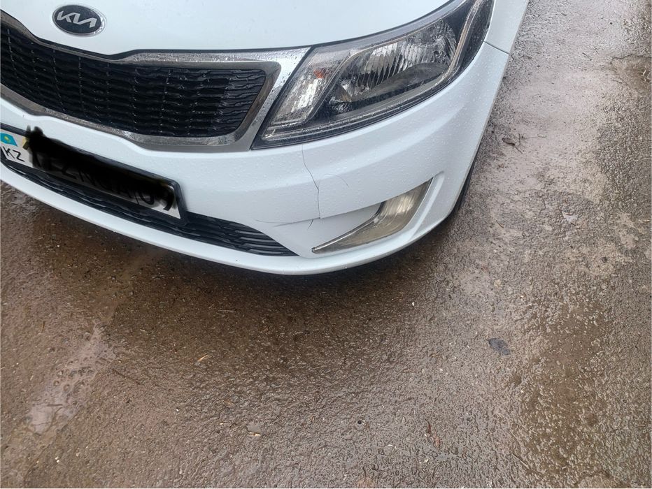 Передний бампер Киа Рио 3