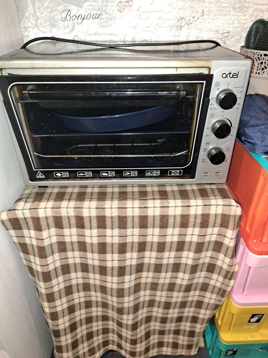 Продам эл духовку артел