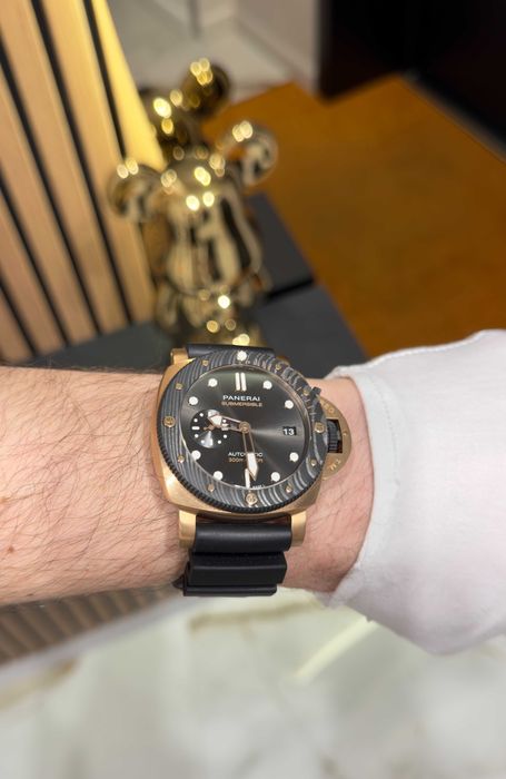 panerai luminor submersible gold/black