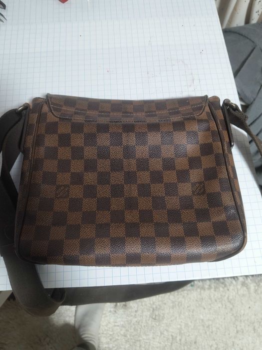 vand Louis Vuitton cum un mic defect originala