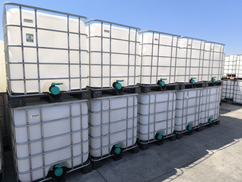 Бидони 1000 литра .Цистерни един тон на метален палет с решетка