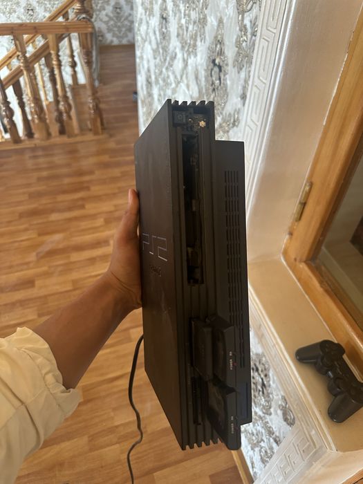 Playstation2 holati yaxshi ichida uyini yoq