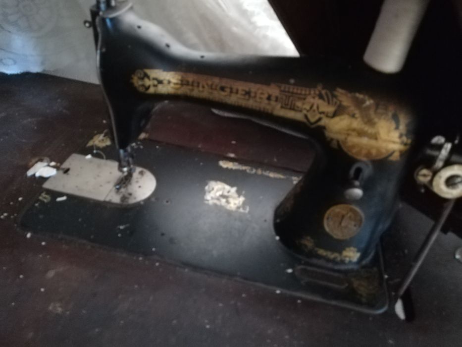 Vând masina de cusut marca Singer