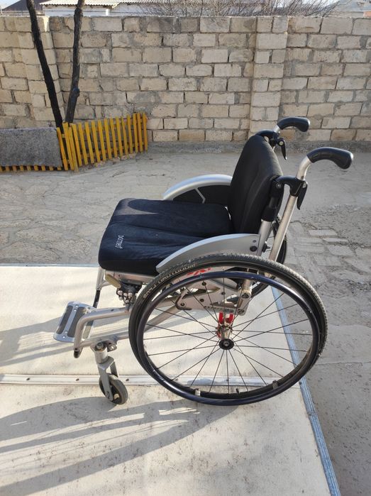 Инвалидная коляска