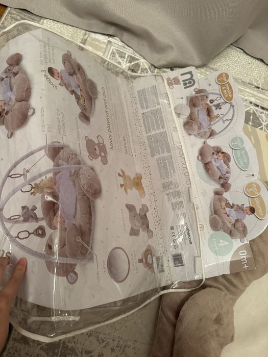 Мишка с подвесными игрушками