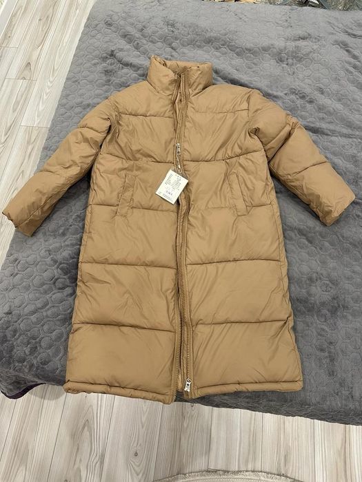 Продаю  женский пуховик