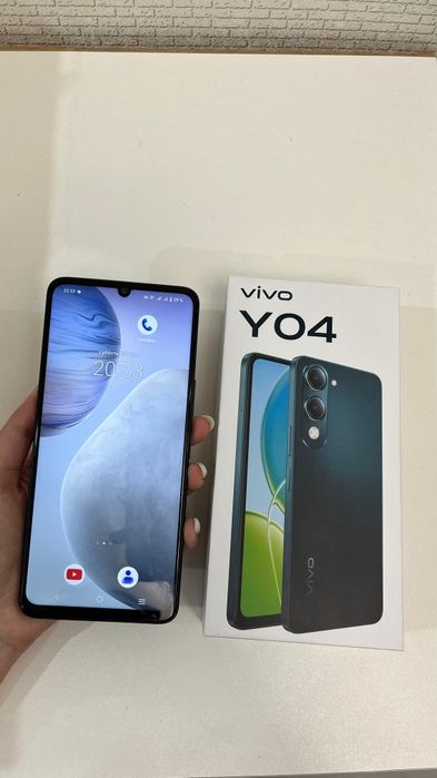 Телефон  vivo жаңа куйінде тұр.