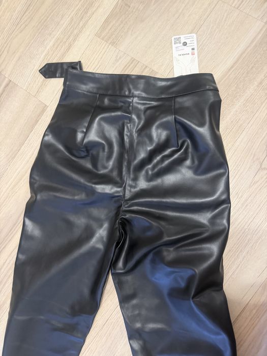кожаные брюки женские